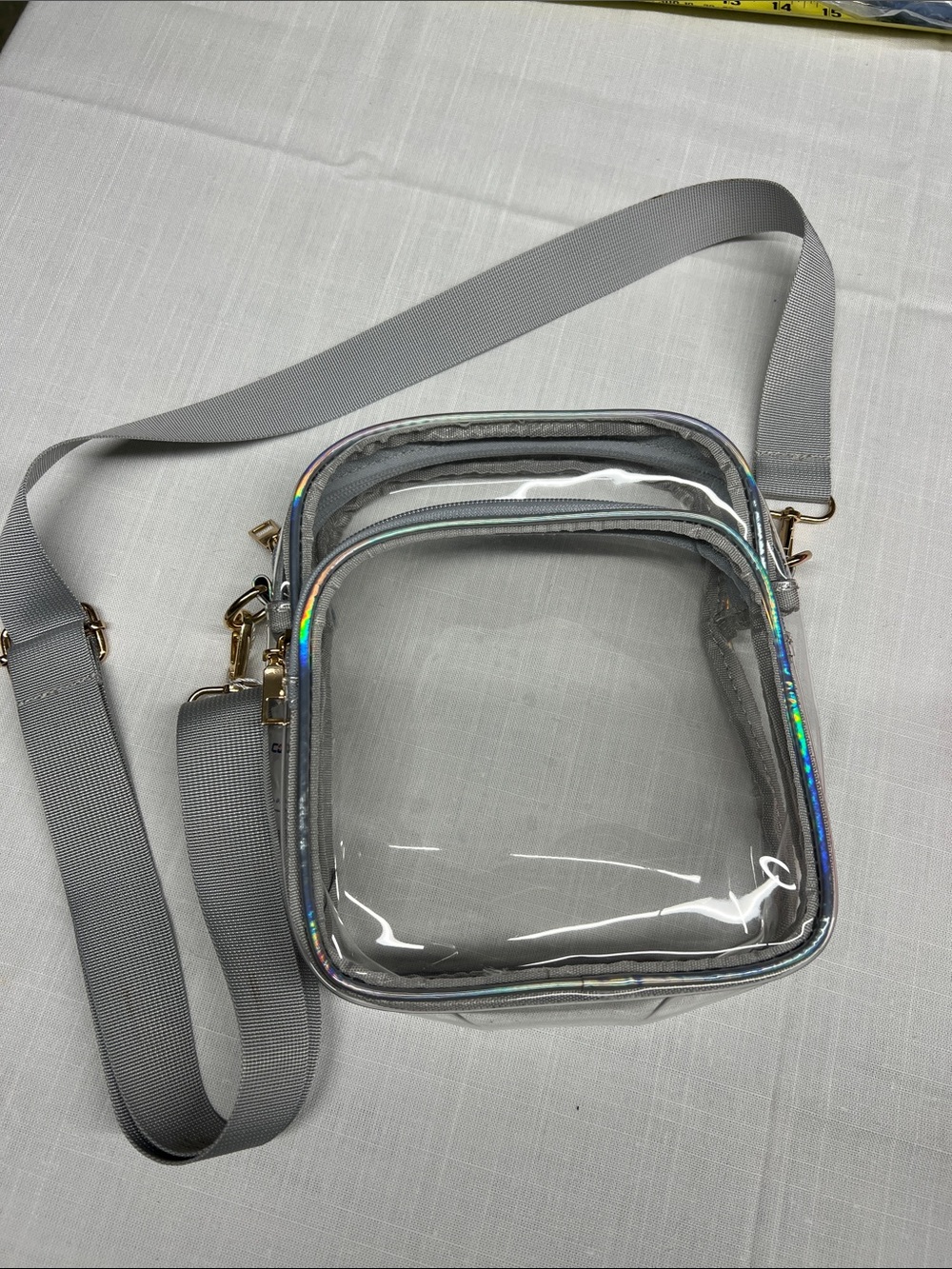 Clear Crossbody Bag with Holographic Trim and Gray Strap